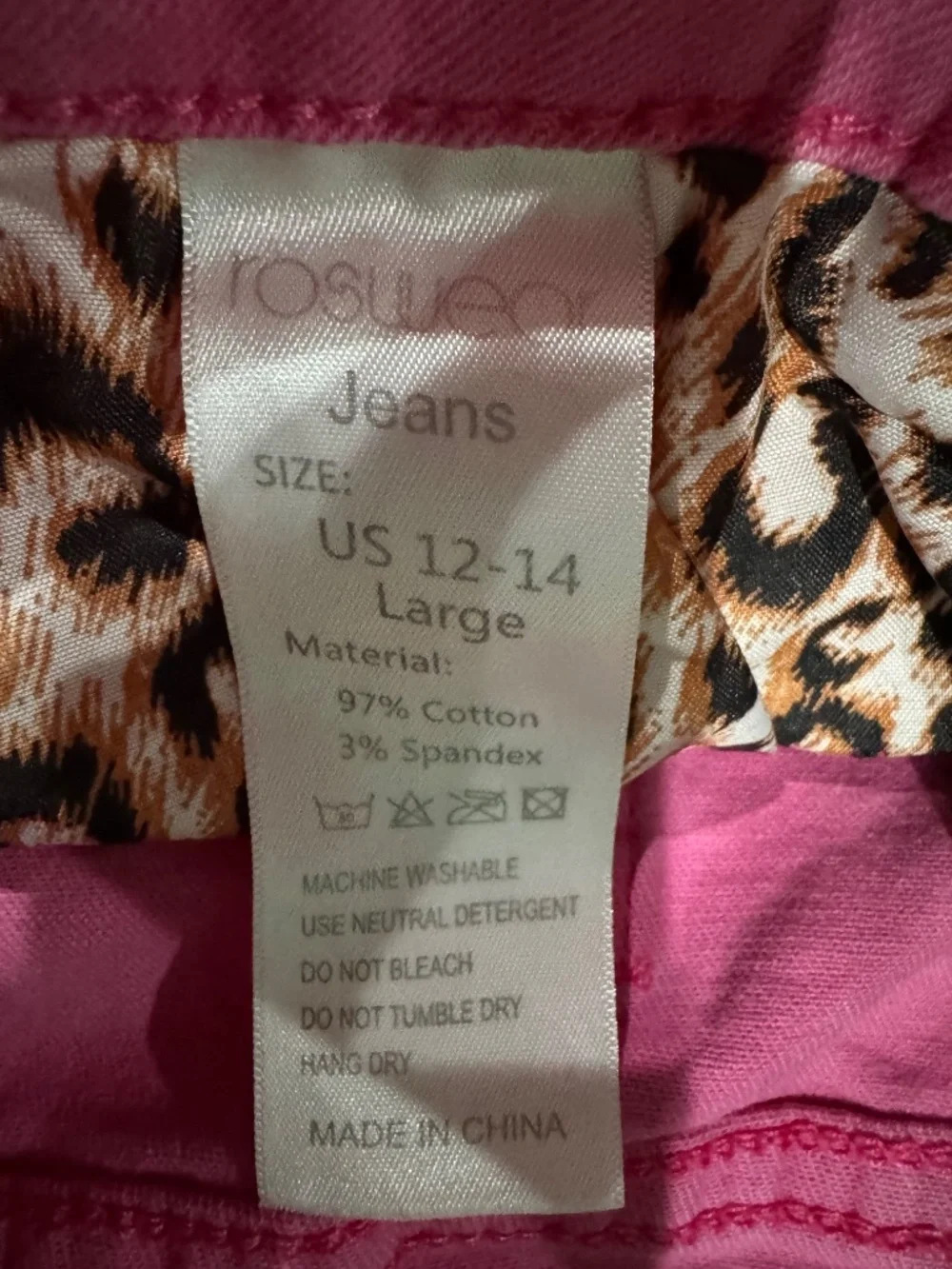 Roswear Women's Ripped Mid Rise Stretchy Denim Shorts in pink with Leopard Large